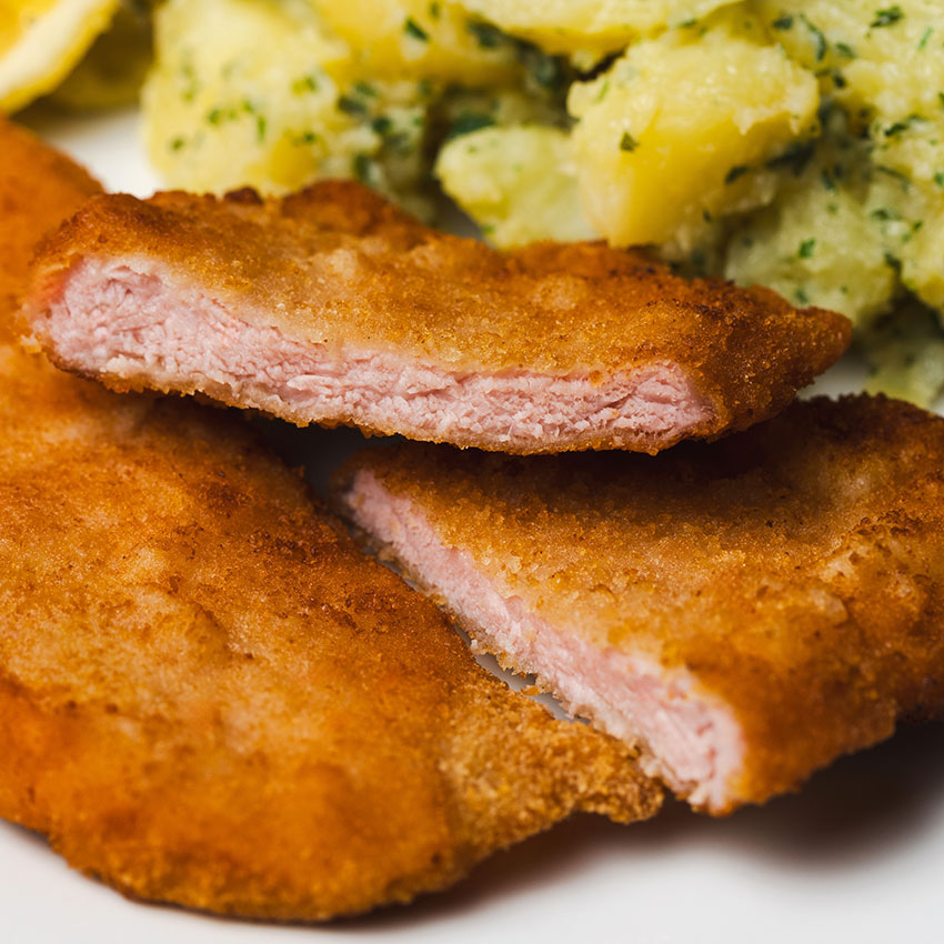 Surschnitzel paniert 10 Stk = 1000 g tiefgefroren, Surschnitzel paniert kaufen. Surschnitzel online bestellen, Surschnitzel paniert von Wiesbauer Gourmet