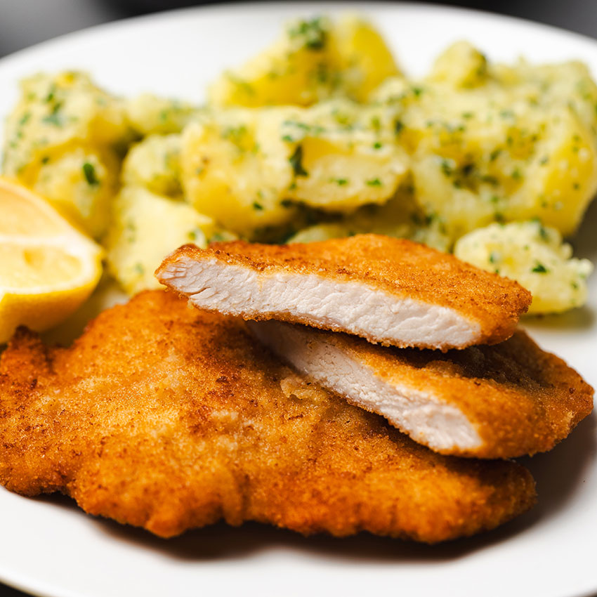Putenschnitzel paniert 10 Stk = 1000 g tiefgefroren, Putenschnitzel kaufen. Putenschnitzel online bestellen, Putenschnitzel paniert von Wiesbauer Gourmet