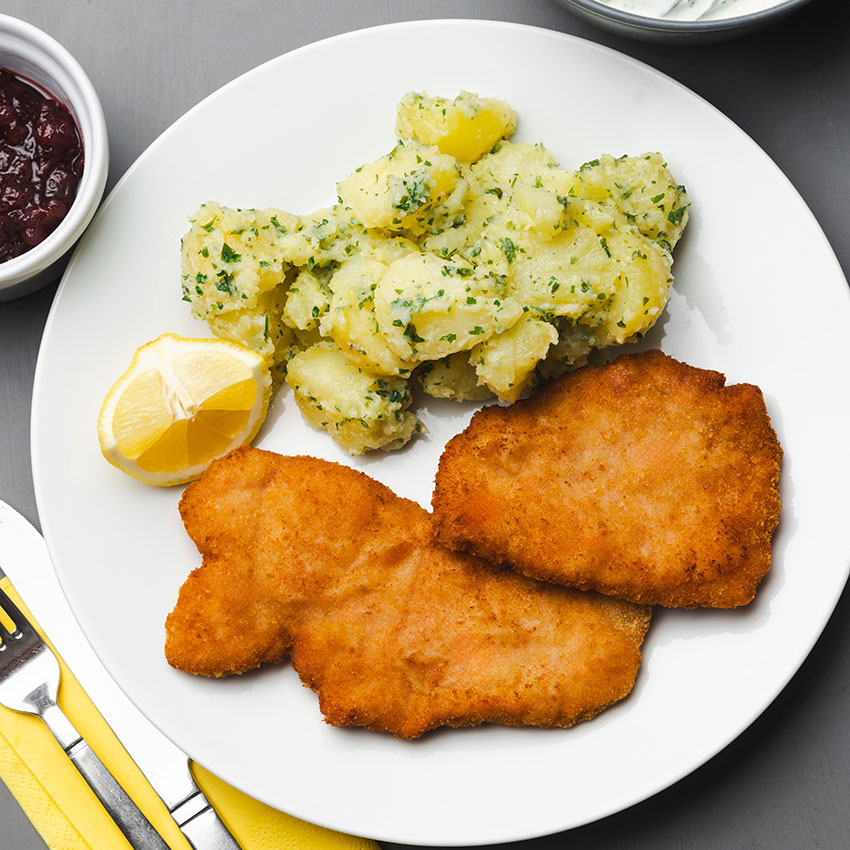 Surschnitzel paniert 10 Stk = 1000 g tiefgefroren, Surschnitzel paniert kaufen. Surschnitzel online bestellen, Surschnitzel paniert von Wiesbauer Gourmet