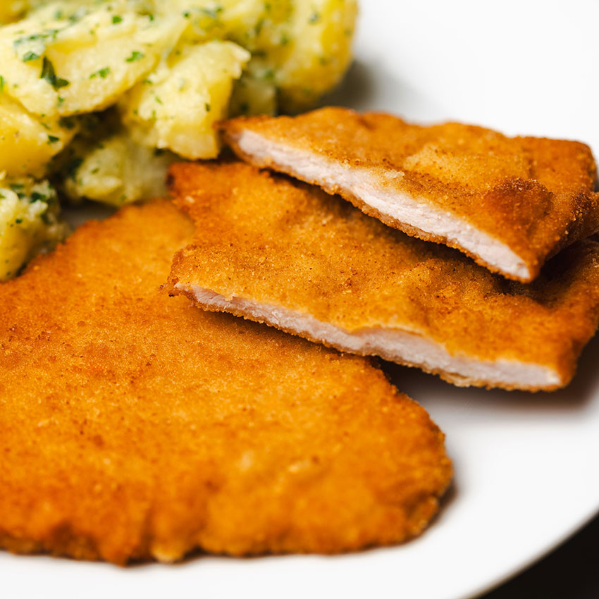 Schweinsschnitzel paniert 10 Stk = 1000 g tiefgefroren, Schweinsschnitzel paniert kaufen. Schweinsschnitzel online bestellen, Schweinsschnitzel paniert von Wiesbauer Gourmet