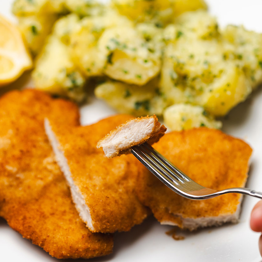 Putenschnitzel paniert 10 Stk = 1000 g tiefgefroren, Putenschnitzel kaufen. Putenschnitzel online bestellen, Putenschnitzel paniert von Wiesbauer Gourmet