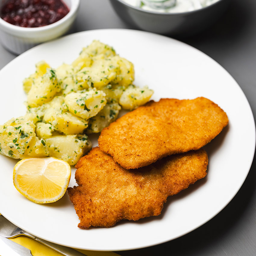 Putenschnitzel paniert 10 Stk = 1000 g tiefgefroren, Putenschnitzel kaufen. Putenschnitzel online bestellen, Putenschnitzel paniert von Wiesbauer Gourmet