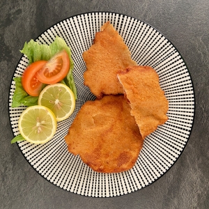 Schweinsschnitzel paniert 10 Stk = 1000 g tiefgefroren für 5 - 10 Personen. Panierte Schweine Schnitzel online kaufen. Schnelle Lieferung in 24 h!