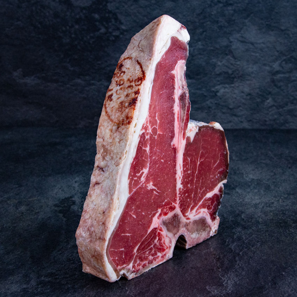 Bio Rinder T-Bone Steak aus Österreich Dry Aged von der Kalbin ➤ Kalbin T Bone Steak kaufen. Sichere 24h Lieferung, garantierte Kühlkette.