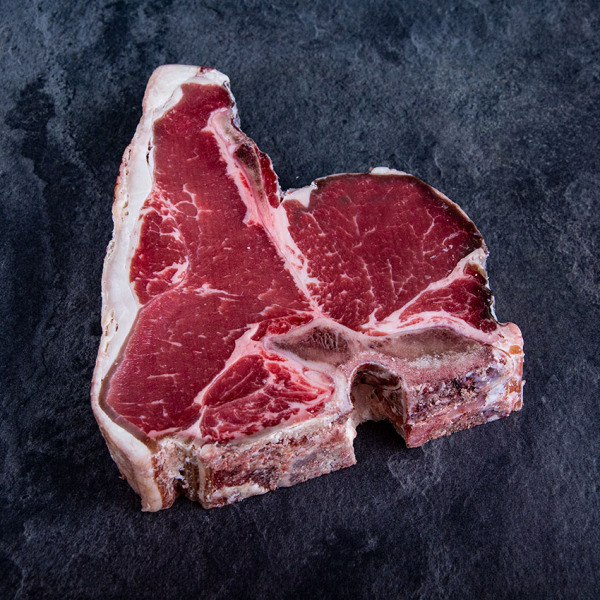 Bio Rinder T-Bone Steak aus Österreich Dry Aged von der Kalbin ➤ Kalbin T Bone Steak kaufen. Sichere 24h Lieferung, garantierte Kühlkette.