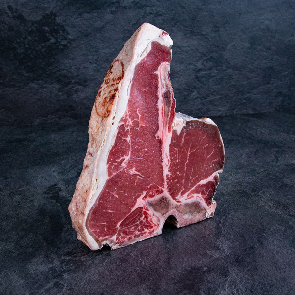 Bio Rinder T-Bone Steak aus Österreich Dry Aged von der Kalbin ➤ Kalbin T Bone Steak kaufen. Sichere 24h Lieferung, garantierte Kühlkette.
